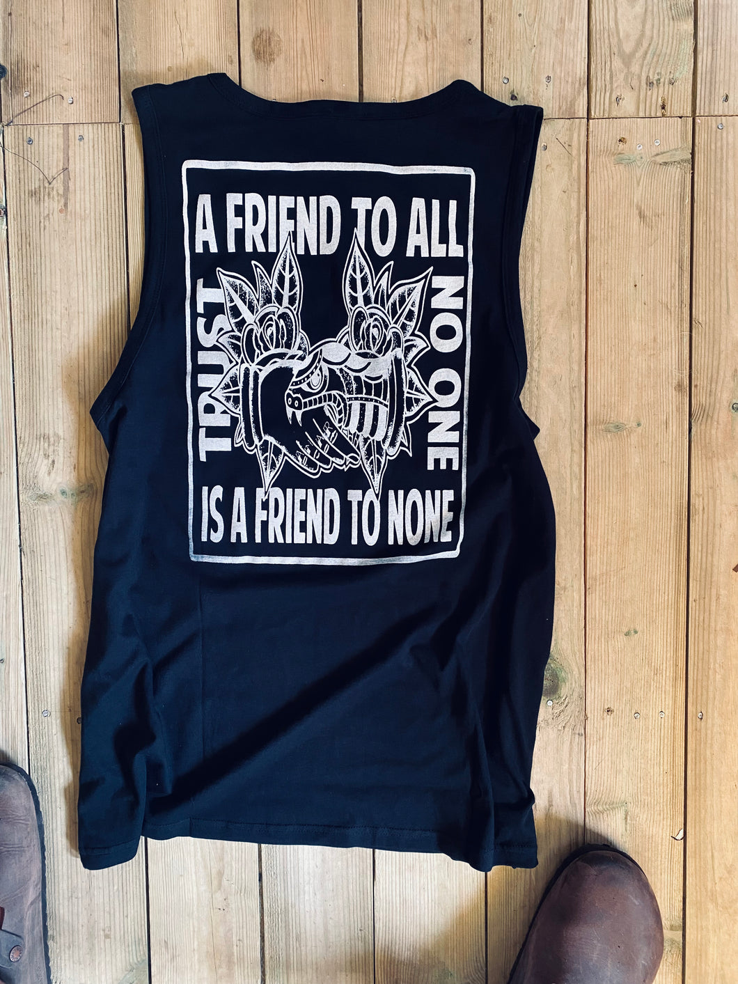 ‘A friend to all’ black vest